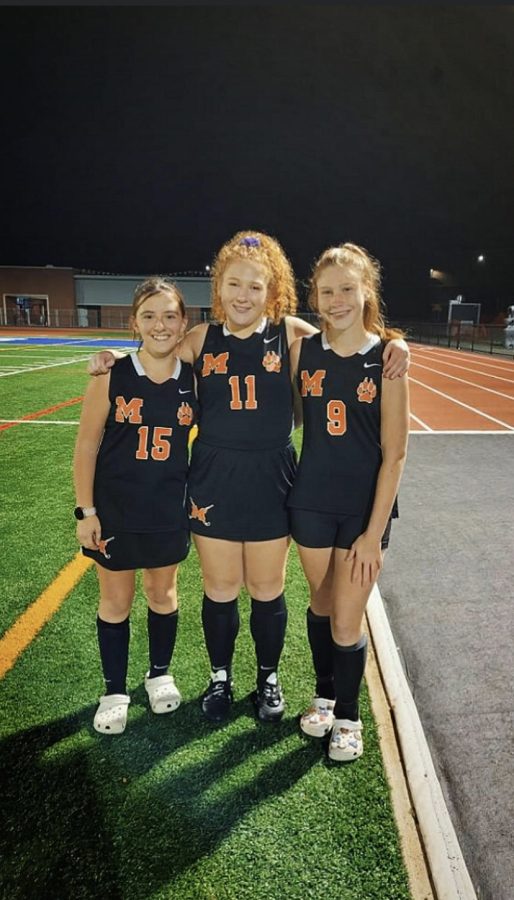 Senior Chloe Heintzelman with Freshman Regan Klinefelter and Freshman Ashlyn Shuffstall, who all participate in field hockey together.