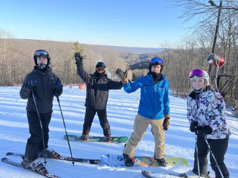 Members of the Outdoor Club enjoy a ski trip.