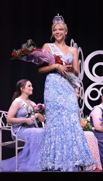 Lilly Batman being crowned Harvest Princess at Milton High School Auditorium