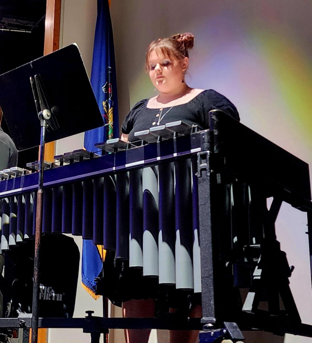 Gabrielah Heckman  playing percussion during the spring concert