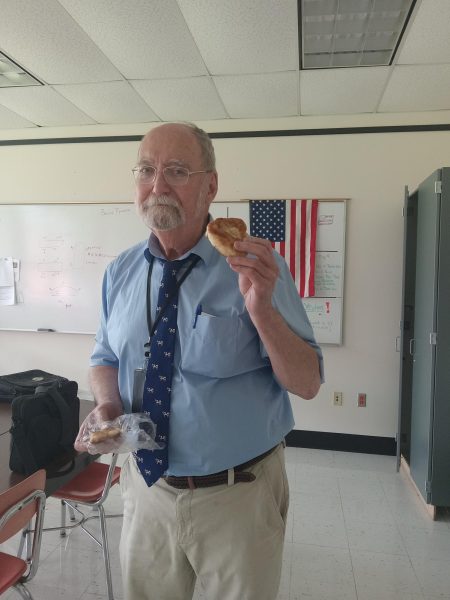 Mr. O'Brien shows a doughboy, one of his favorite snacks.