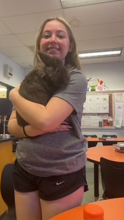 Junior Madison Coup takes a brain break with Mocha.